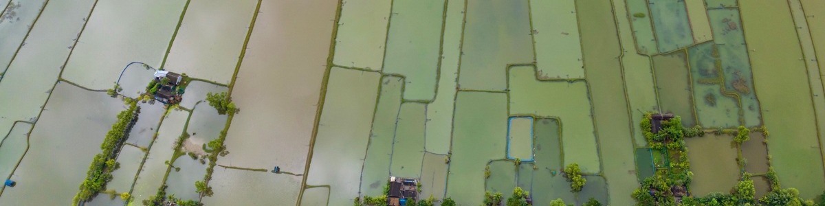 Aerial view of agricultural land and communities affected by flooding